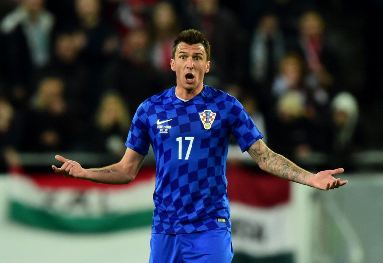 kroatischer Nationalspieler Mario Mandzukic beim Spiel Kroatien gegen Ungarn am 26.März.2016. / AFP / ATTILA KISBENEDEK